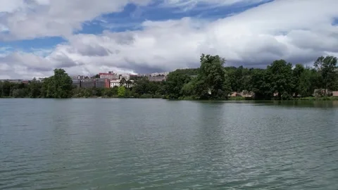 Lake View of Parc de la Tete dOr and Lyon Cityscape, France Video stock 348296491