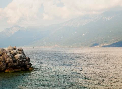 Lake view with rocks Stock Photos