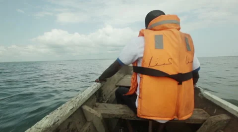 LAKE VOLTA CANOE Stock Footage 41476347