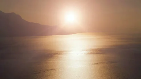 Lake water reflections. sun sunset sunshine. magic hour. pond sea background Video stock 37995002