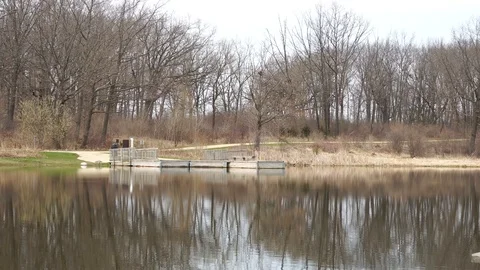 Lake of water in the spring fall, pan shot, 4k Stock Footage 115273161