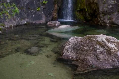 A lake with a waterfall Stock-Fotos