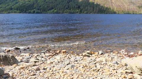 Lake waves on a pebble shore. Stock Footage 112683438