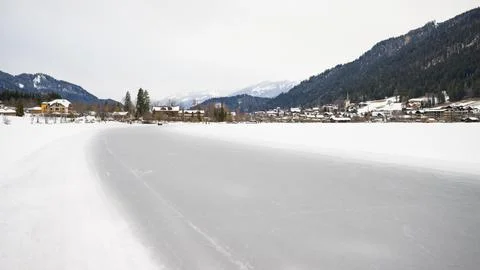 Lake Weissensee on a cold day in winter Stock Photos