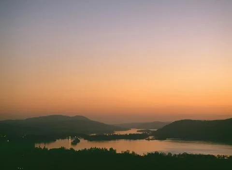 Lake Windermere at dusk in the Lake District UK Stock Photos