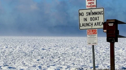 Lake In Winter Steam Clouds No Swimming Sign CU Vídeo Stock 83863089