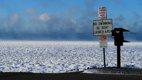 Lake In Winter Steam Clouds No Swimming Sign WS Stock-Footage 83863092