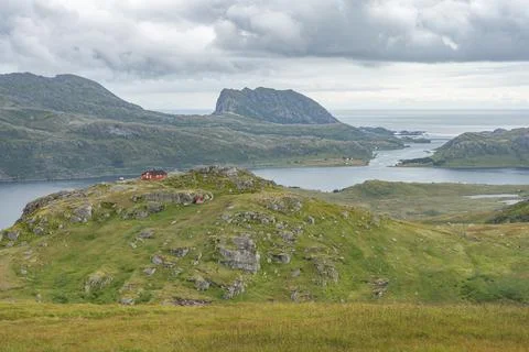 Lakes valley cloudy view from Ryten mountain and ocean in background Stock Photos