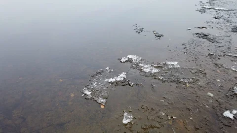 Lakeshore with ice when the lake start freezing over, Finland Stock Footage 119811054