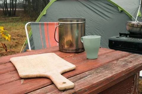 Lakeside camping scene, Camp setup by tranquil waters, Arranged campsite area Stock Photos