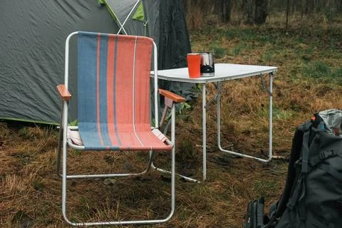 Lakeside camping scene, Camp setup by tranquil waters, Arranged campsite area Stock Photos