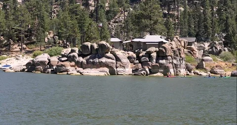 Lakeside House by the Rocks Stock Footage 106172624
