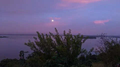 Lakeside landscape view with moon Stock Photos