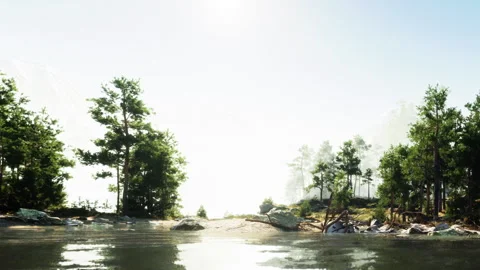 Lakeside scene with trees and mountains in the background near water Stock Footage 344391714