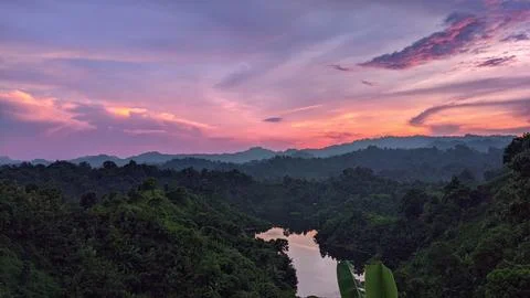 Lakeside view of surrounding sunset Stock Photos