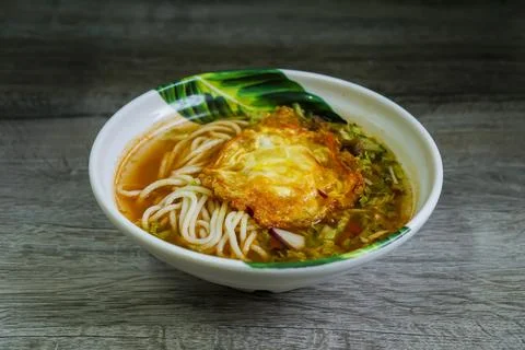 Laksa with fried egg. 写真素材
