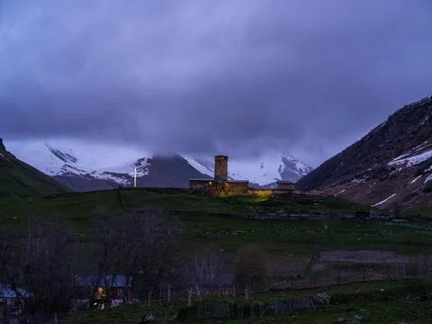Lamaria Monastery Svan tower under gloomy overcast sky in Ushguli Fotos de archivo