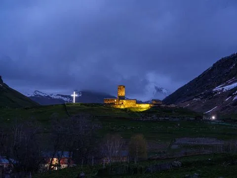 Lamaria Monastery Svan tower under gloomy overcast sky in Ushguli Stock Photos
