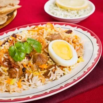 Lamb biryani with egg Stock Photos