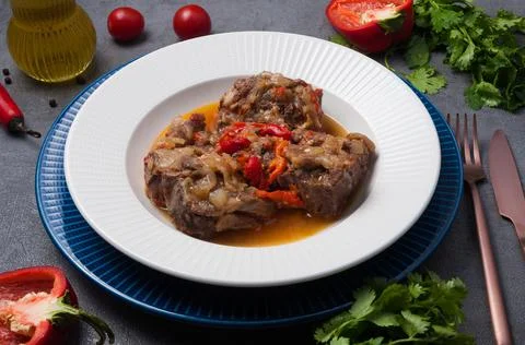 Lamb on the bone, stewed with vegetables Stock Photos