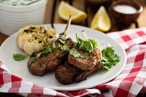 Lamb chops grilled with herbs Stock Photos