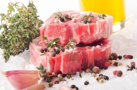 Lamb chops with spices and thyme Stock Photos