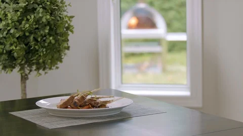 Lamb Entree With Oven In The Background Stock Footage 124651217