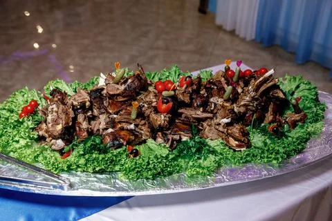 Lamb kebab on a large platter Stock Photos