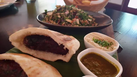 Lamb kebab stuffed in Pita bread serve with Tabouli salad and fries Lebanes.. Stock Footage 240206417