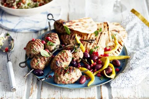 Lamb kofta and flat bread on plate, close-up Stock Photos