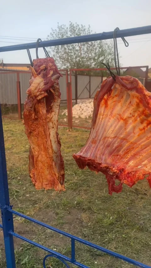 Lamb meat is dried in the air, marinated for cooking Stock Footage 276258015