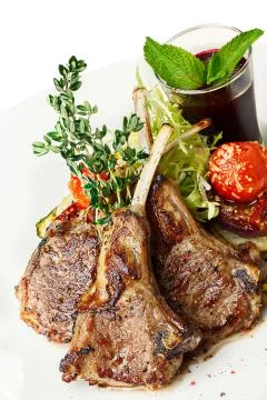 Lamb rack with garnish Foto stock