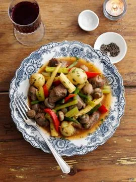 Lamb ragout with spring vegetables Stock Photos