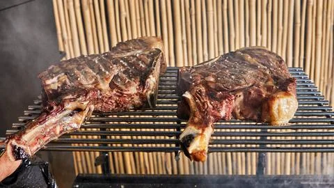 Lamb ribs are cooked on the grill for serving in catering Stock-Fotos