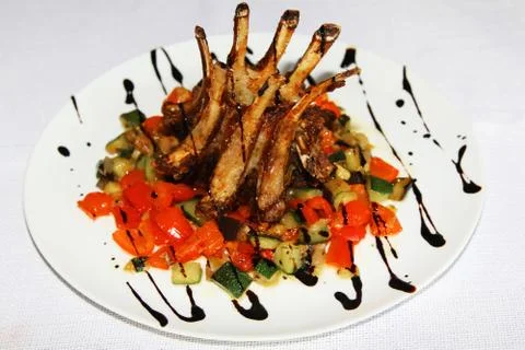 Lamb ribs with vegetables Stock-Fotos
