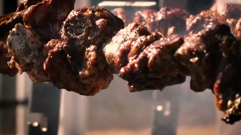 Lamb smoking on BBQ spit - Slow Motion Stock Footage 66838696