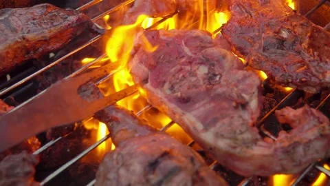 Lamb steak flipped on the grill Stock Footage 72537670