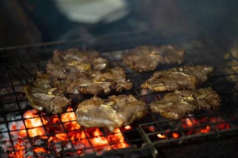 Lamb steak on the grill Stock Photos