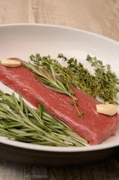 Lamb steaks with herbs Stock Photos