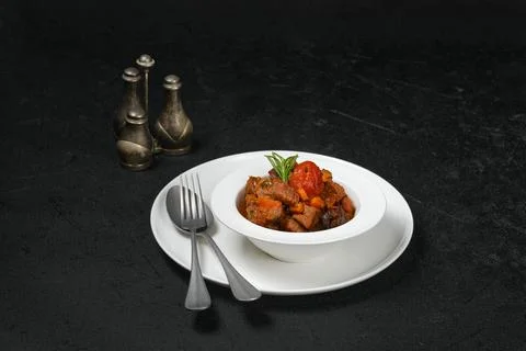 Lamb stew with tomato on a plate Foto stock