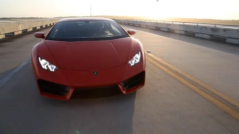 Lamborghini Driving Over Bridge Stock Footage 103973969