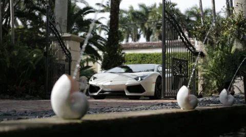 Lamborghini Luxury Sports Car Driving Into Mansion As Gates Open Stock Footage