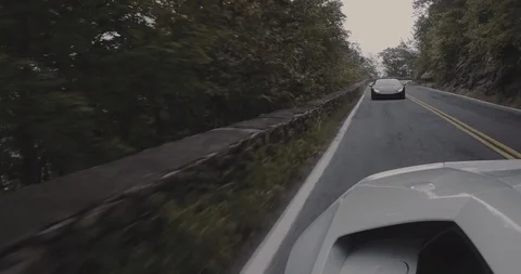Lamborghini mountain drive 3 Stock Footage 105122127