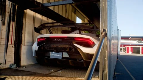 Lamborghini rolling into trailer  B-ROLL Stock Footage 237390182
