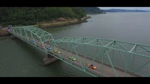 Lamborghini's Driving Over Bridge 4k Stock Footage 103974009