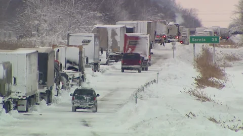 Lambton Ont, Canada Dec 12 2010 Historic blizzard strands thousands on highway Stock Footage 323577271