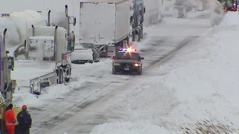Lambton Ont, Canada Dec 12 2010 Historic blizzard strands thousands on highway Stock Footage 323577589