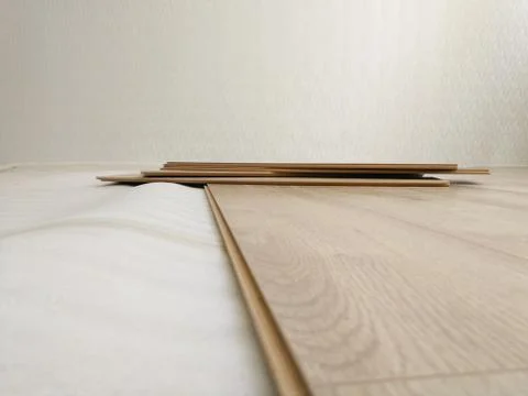 Laminated flooring under construction process. Home renewal concept Foto stock