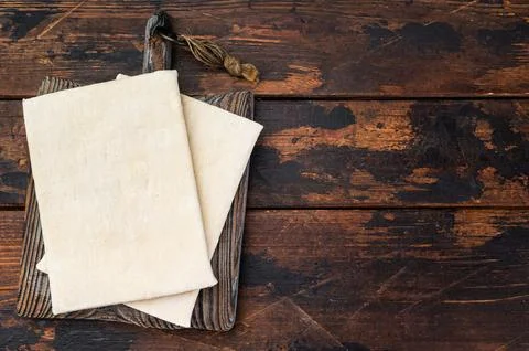 Laminated pastry dough sheets on rustic wood background, baking ingredient .. Stock Photos