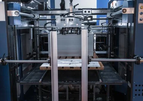 Laminating machine in printing industry Stock Photos